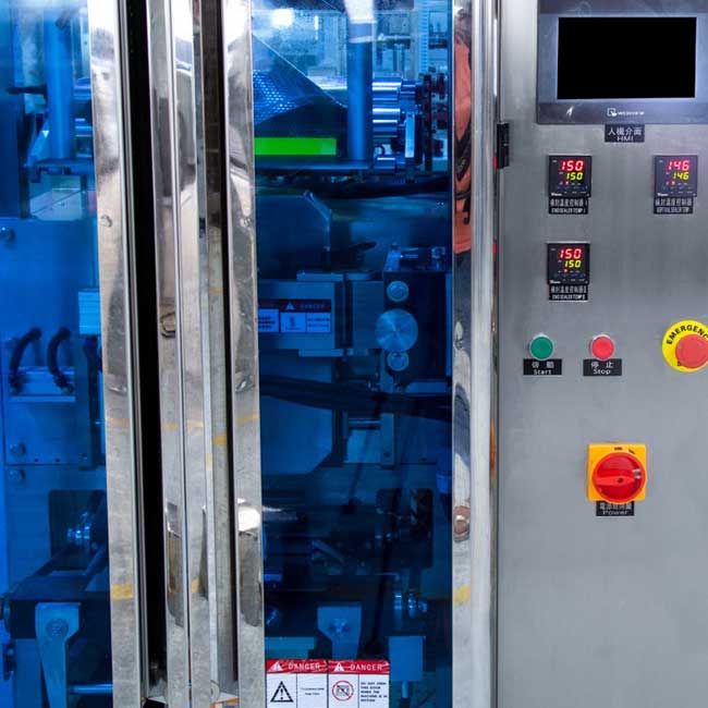 Automatic Powder & Liquid Packaging Machine Automatic Powder & Liquid Packaging Machine